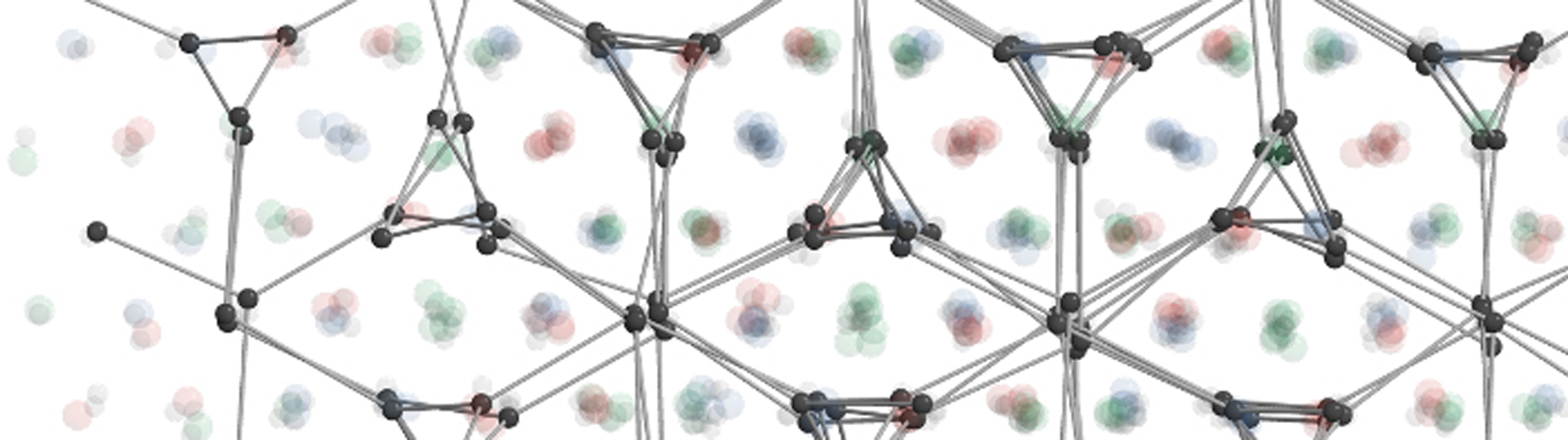 The structural illustration shows the triple-double-gyroid, a new crystal structure discovered by the researchers at Northwestern University, the University of Michigan and Argonne National Laboratory. It has never been found in nature or synthesized before. The translucent balls in red, green and blue show the positions of large nanoparticles. Each color represents a double-gyroid structure. The dark grey balls and sticks show the locations of the smaller, electron-like particles in one of three types of sites in which those particles appear. The formation of this new crystal structure is a result of the way electron-like nanoparticles control the number of neighbors around the larger nanoparticles. Credit: Sangmin Lee, Glotzer Group, University of Michigan