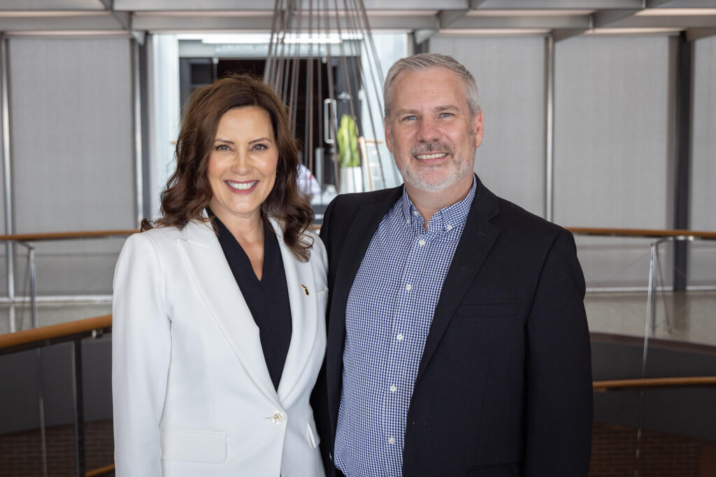 Maten pictured with Governor Gretchen Whitmer at a GM event in 2022.